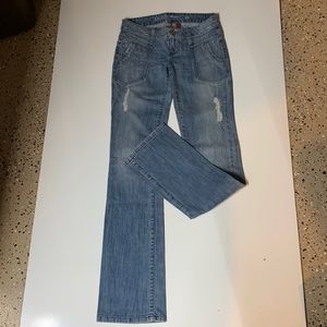 Woman’s Daredevil Boot Cut Jeans by “ Guess “ Size 24 inch waist